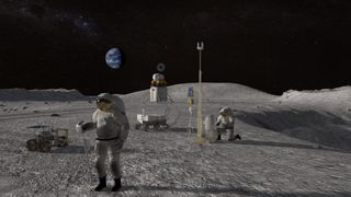 two astronauts work on the surface of the moon.  They are surrounded by equipment and Earth can be seen in the background.