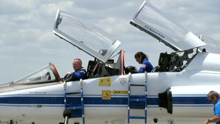 Boeing Crew Flight Test astronauts Butch Wilmore (left) and Suni Williams, both of NASA, arrive at the Kennedy Space Center in Florida on April 25 in a T-38 jet before their launch.